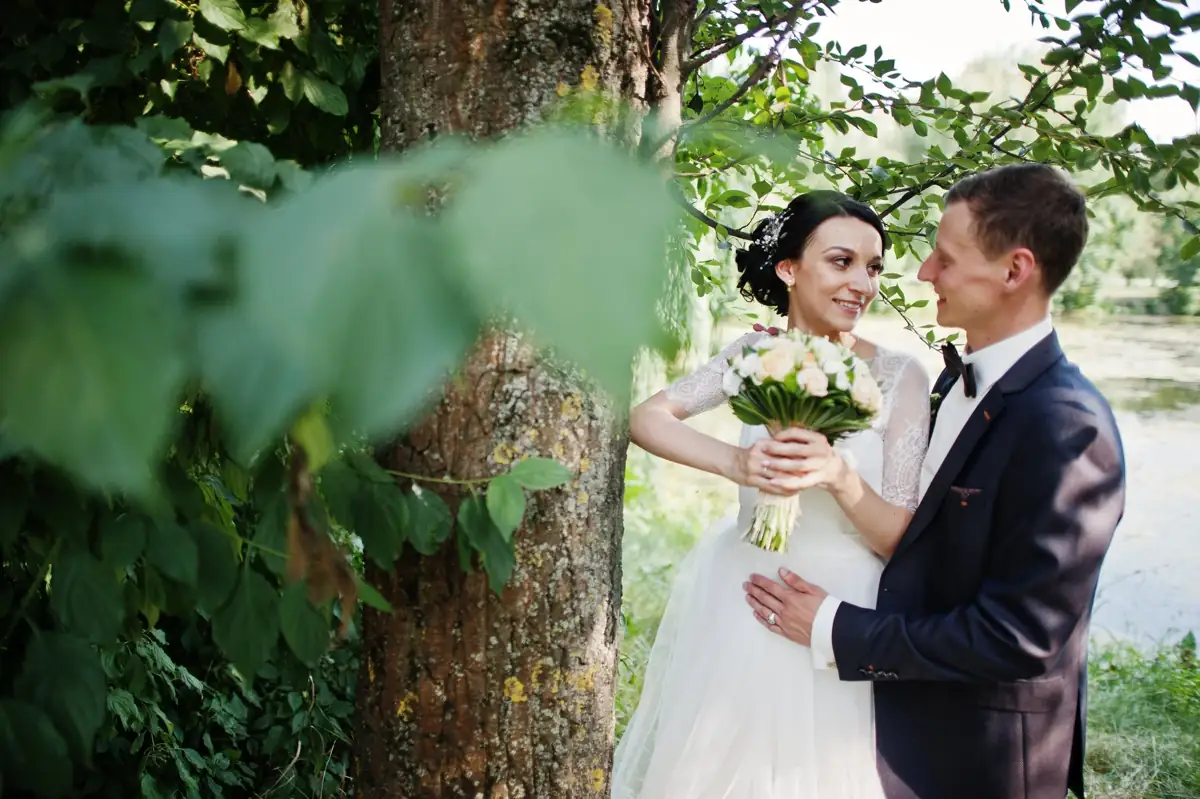 Bride and groom in the woods